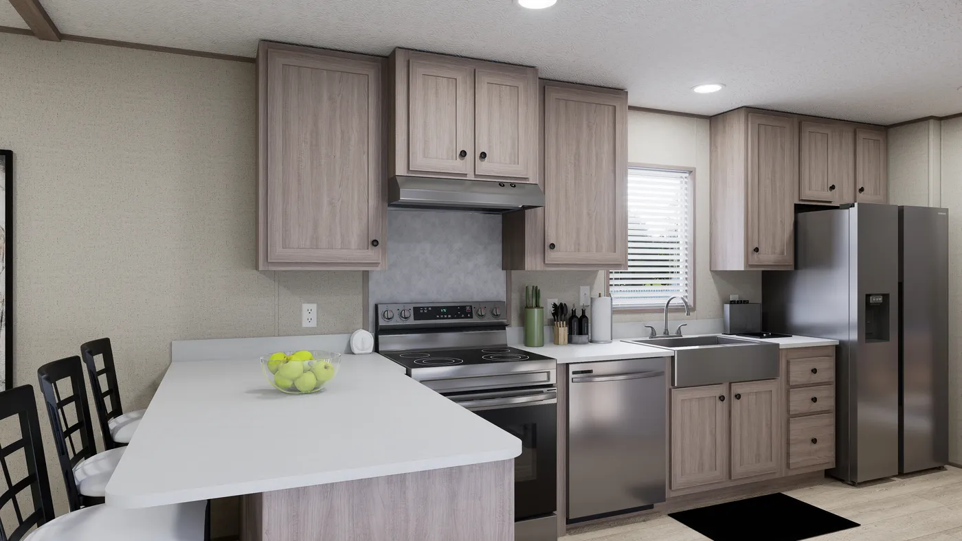 The THE ANNIVERSARY 76 Kitchen. This Manufactured Mobile Home features 3 bedrooms and 2 baths.