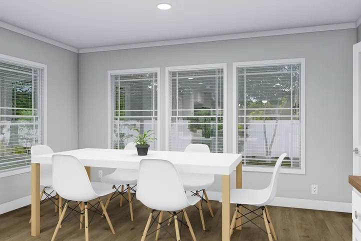 The REMINGTON Dining Area. This Manufactured Mobile Home features 3 bedrooms and 2 baths.