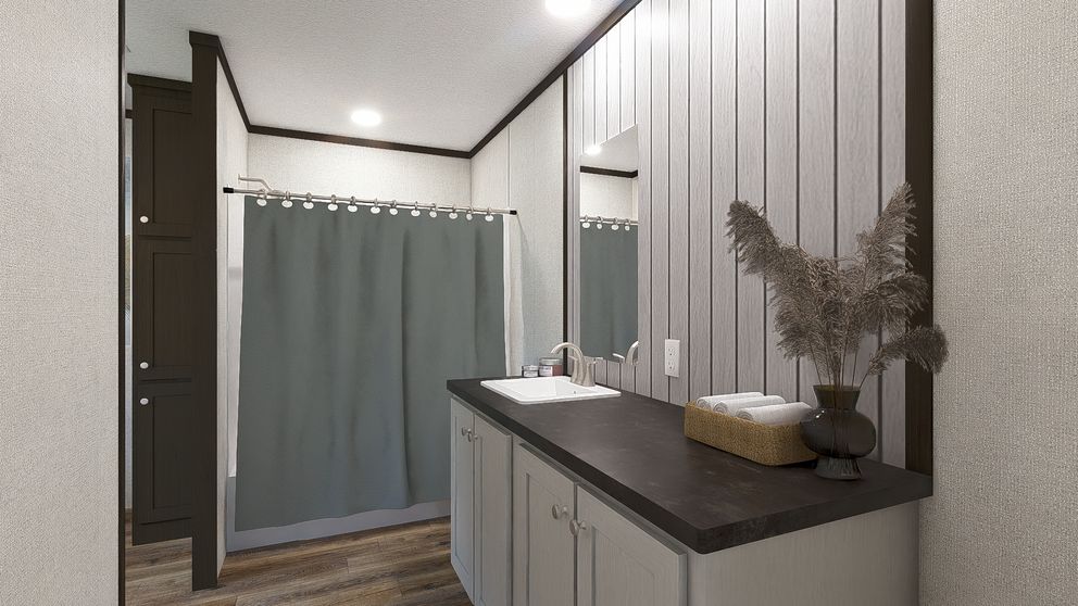 The GLIMPSE Primary Bathroom. This Manufactured Mobile Home features 3 bedrooms and 2 baths.