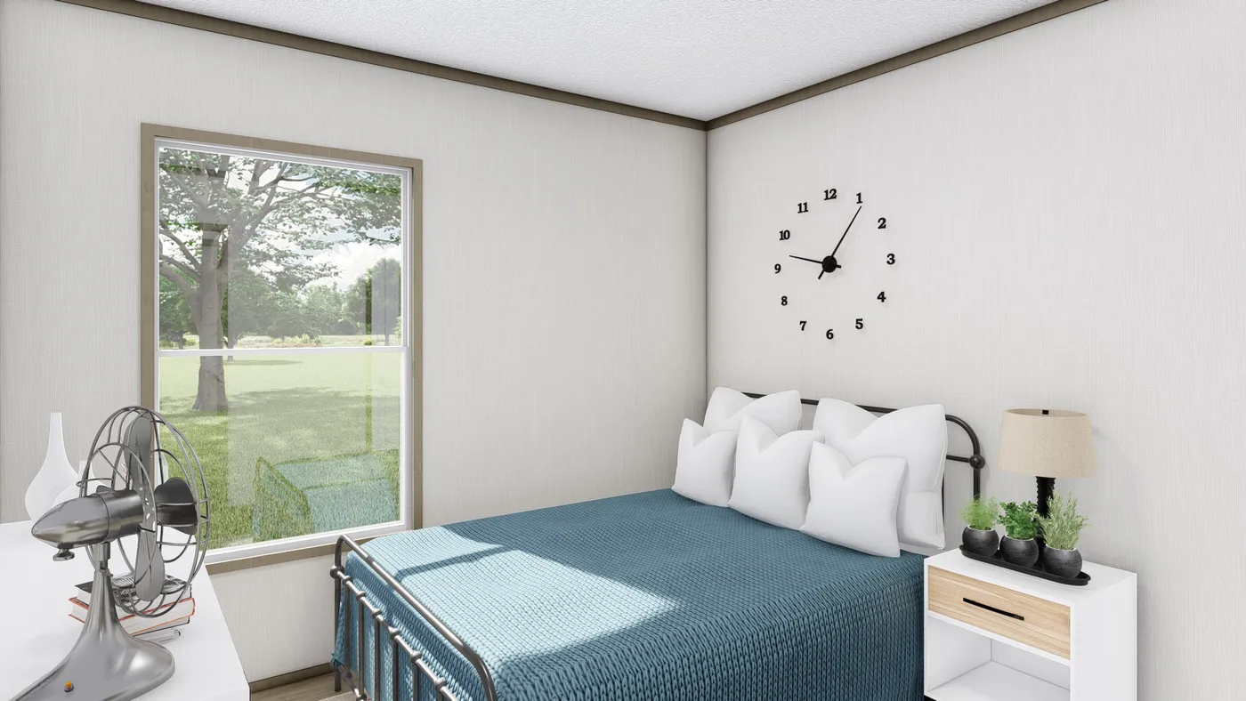 The COOK Bedroom. This Manufactured Mobile Home features 3 bedrooms and 2 baths.