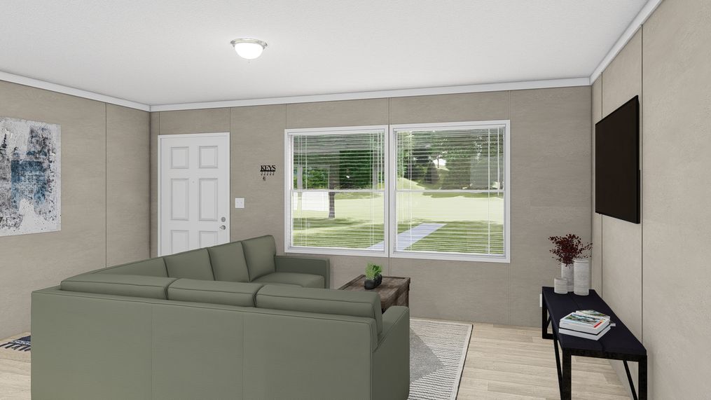 The ULTRA PRO 3 BR 28X60 Living Room. This Manufactured Mobile Home features 3 bedrooms and 2 baths.