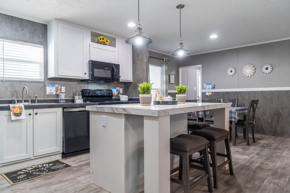 The TRADITION 48 Kitchen. This Manufactured Mobile Home features 3 bedrooms and 2 baths.