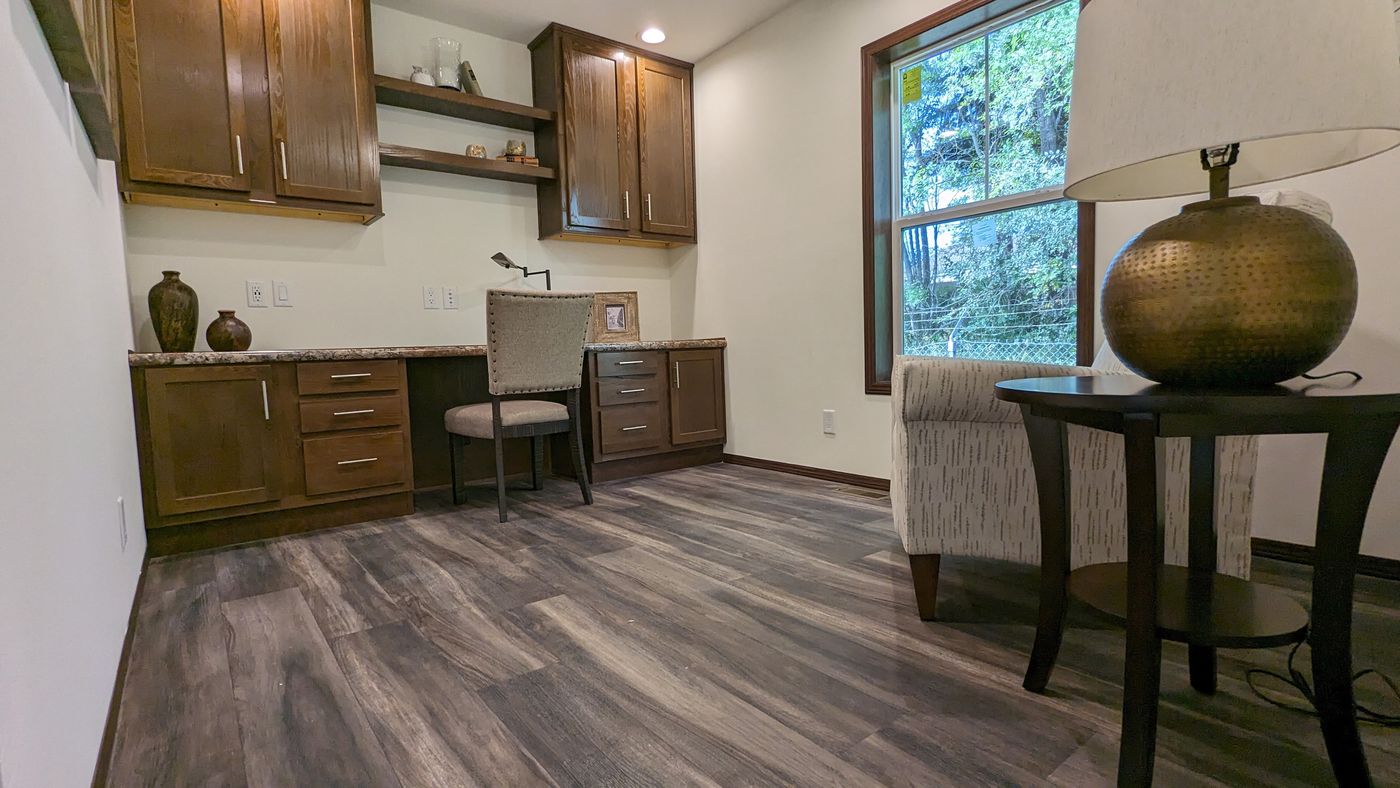 The LEGEND 327-1 Den. This Manufactured Mobile Home features 3 bedrooms and 2 baths.