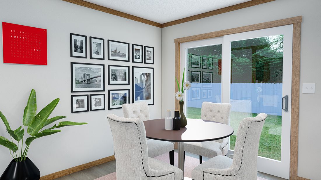 The LIZZIE Dining Area. This Manufactured Mobile Home features 3 bedrooms and 2 baths.