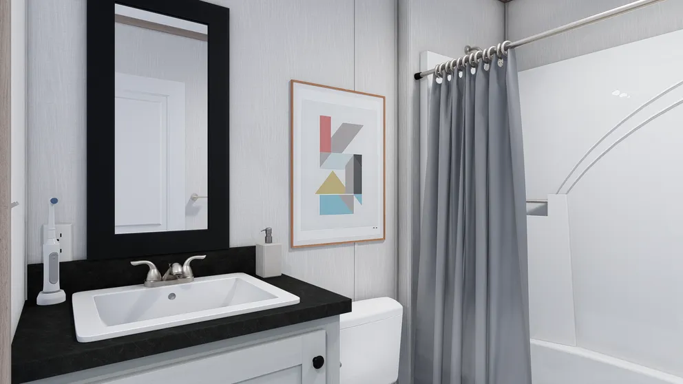 The 6616-4772P THE PULSE Guest Bathroom. This Manufactured Mobile Home features 2 bedrooms and 2 baths.