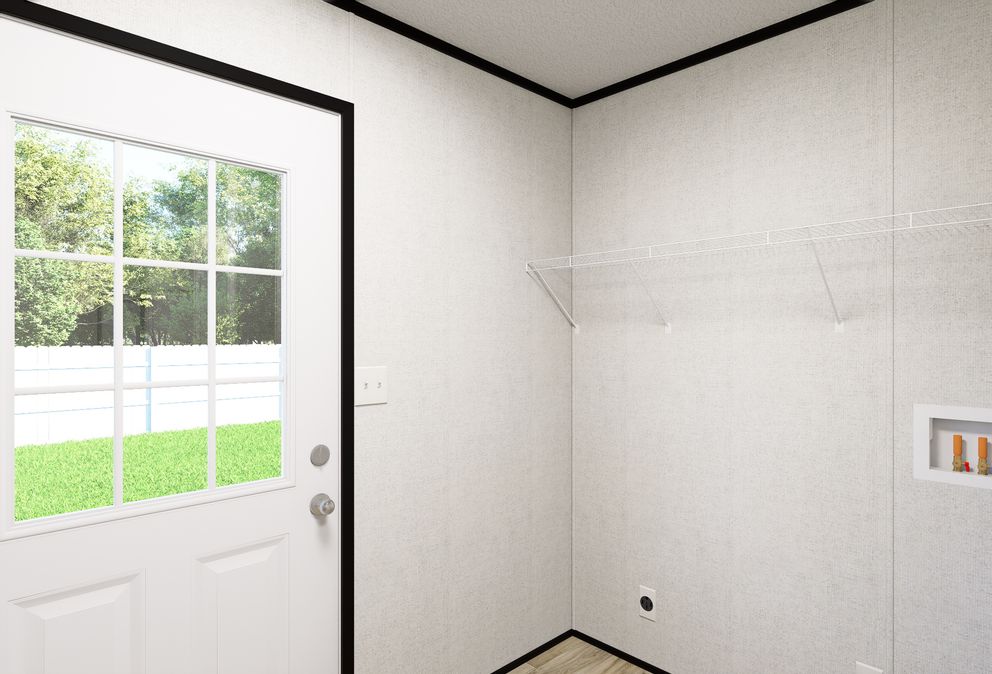 The ECLIPSE Utility Room. This Manufactured Mobile Home features 4 bedrooms and 2 baths.