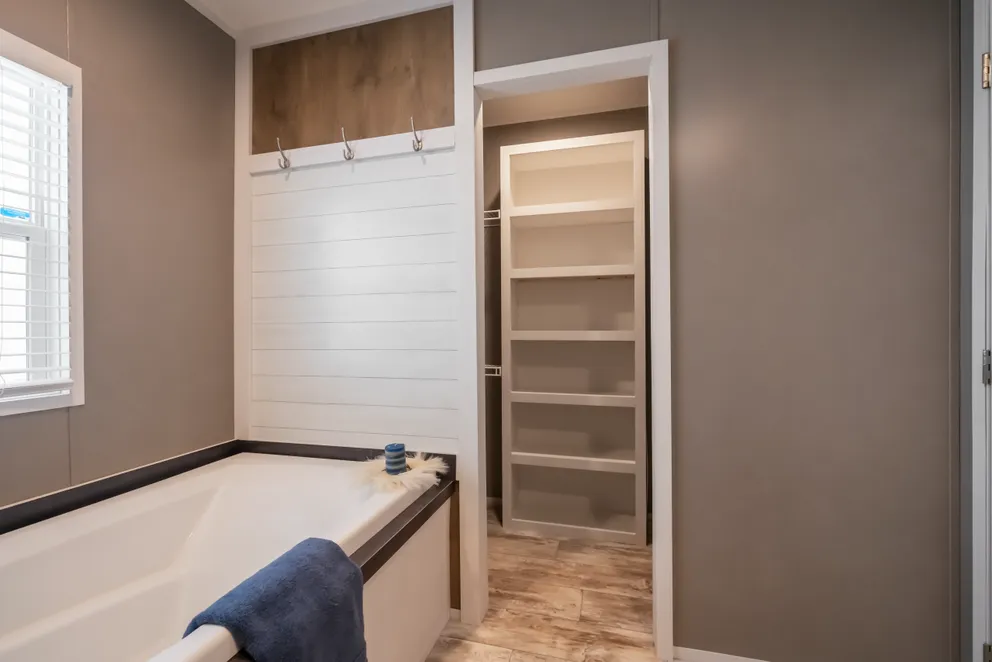 The LIBERTY Primary Bathroom. This Manufactured Mobile Home features 3 bedrooms and 2 baths.