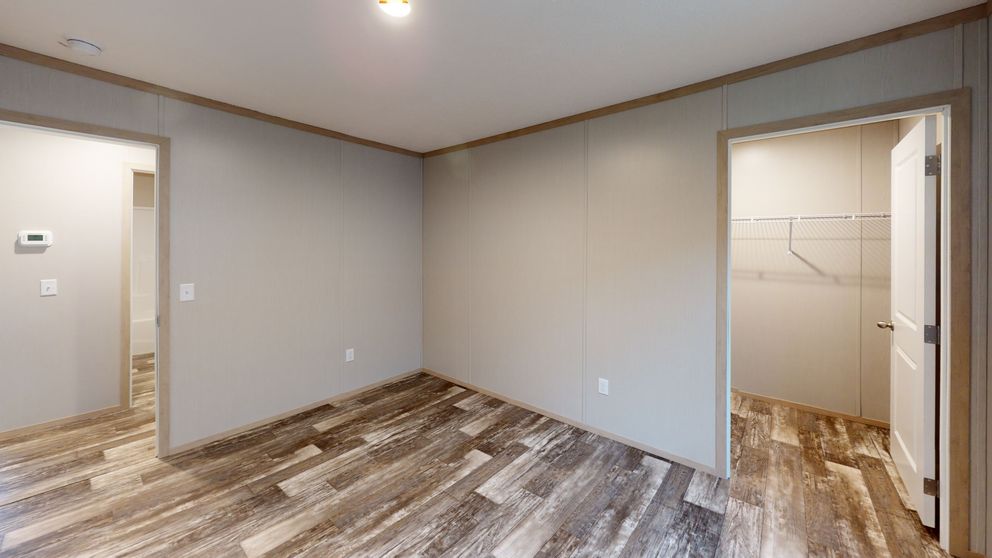 The FRANKLIN Guest Bedroom. This Manufactured Mobile Home features 3 bedrooms and 2 baths.