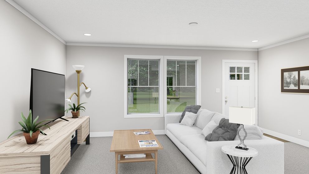 The SHOUT Living Room. This Manufactured Mobile Home features 3 bedrooms and 2 baths.