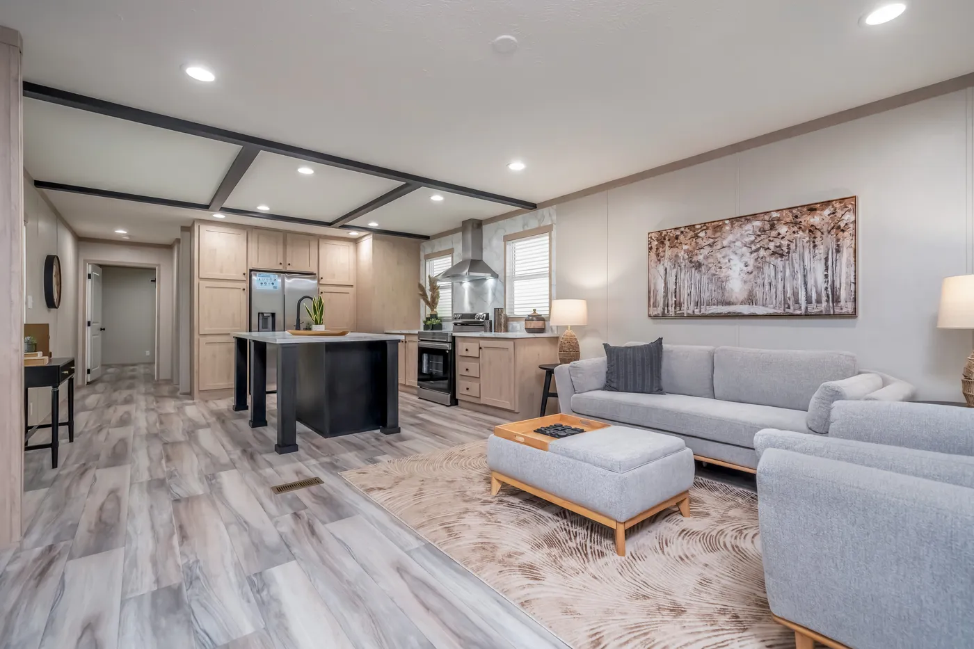 The ANNIVERSARY JEWEL Living Room. This Manufactured Mobile Home features 3 bedrooms and 2 baths.