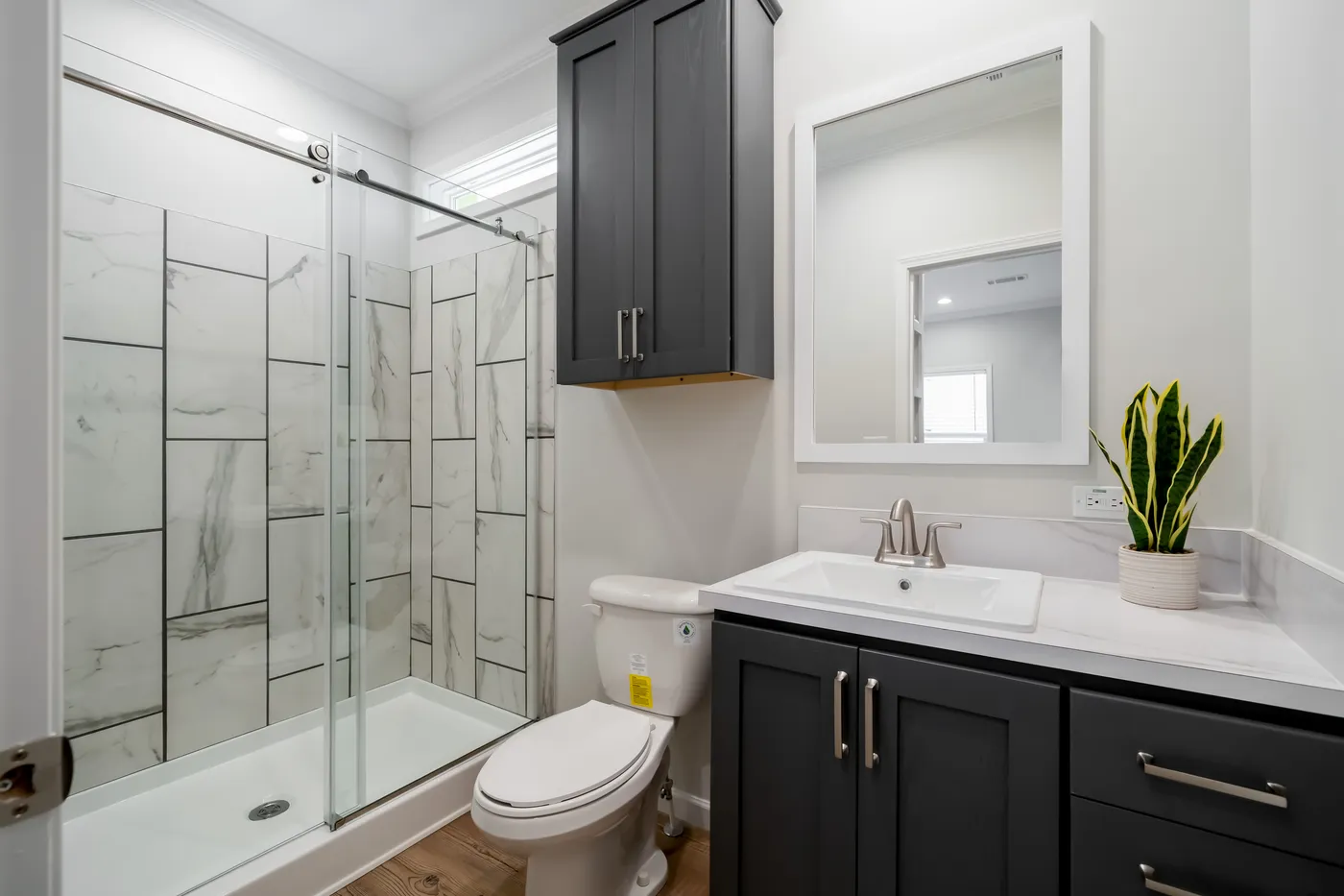 The TIFFANY Primary Bathroom. This Manufactured Mobile Home features 2 bedrooms and 2 baths.
