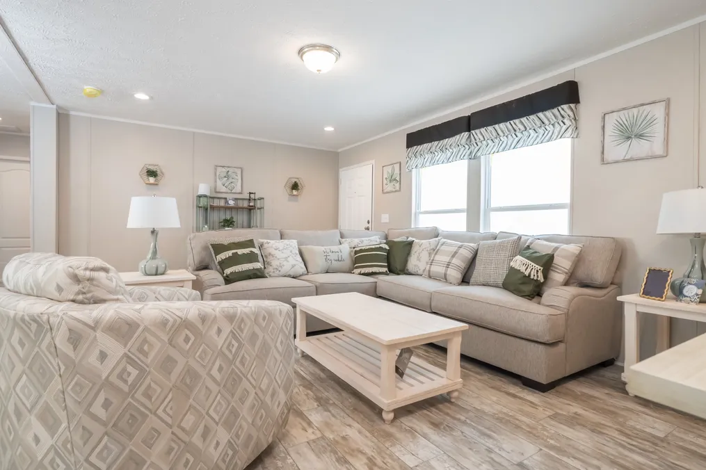 The BENJAMIN Living Room. This Manufactured Mobile Home features 3 bedrooms and 2 baths.