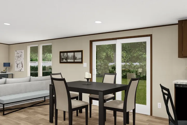 The PRIDE Dining Area. This Manufactured Mobile Home features 4 bedrooms and 2 baths.