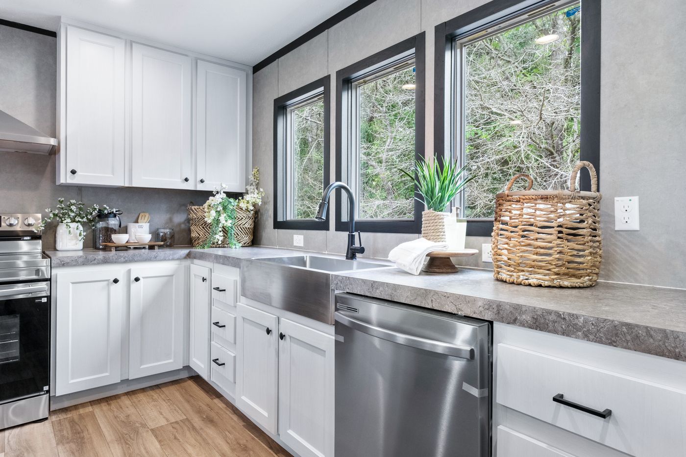 The ABSOLUTE VALUE Kitchen. This Manufactured Mobile Home features 4 bedrooms and 2 baths.
