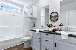 The THE SEDONA Guest Bathroom. This Manufactured Mobile Home features 3 bedrooms and 2 baths.