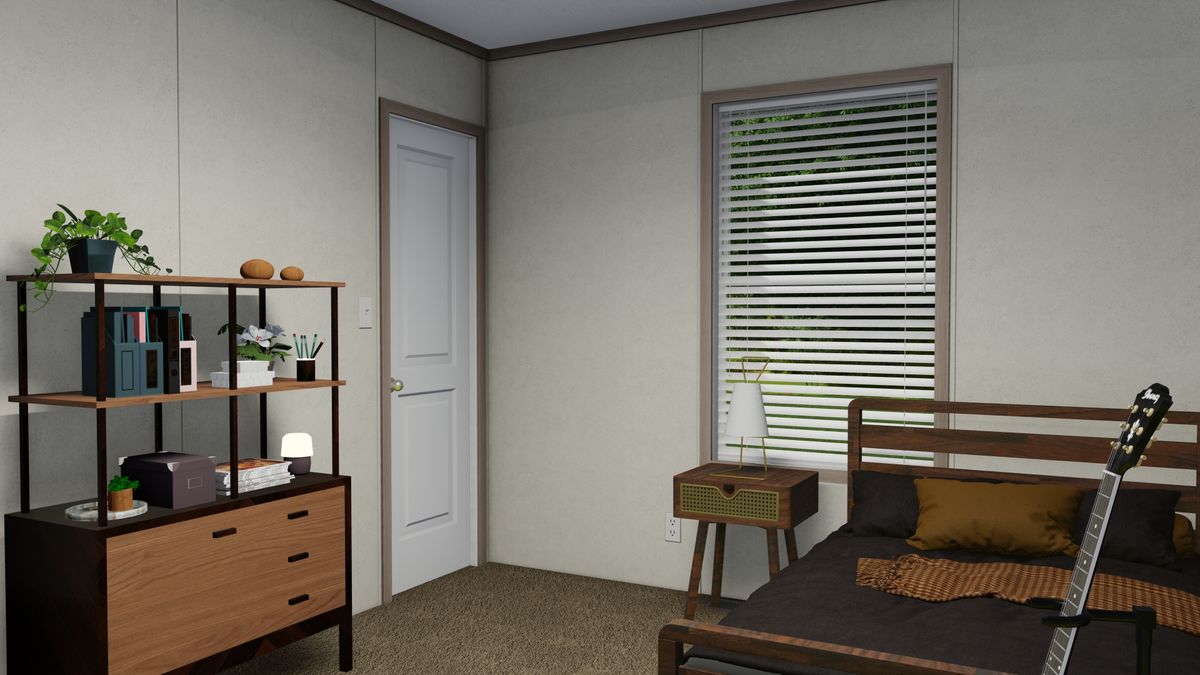 The 7228-5789 THE PULSE Guest Bedroom. This Manufactured Mobile Home features 3 bedrooms and 2 baths.