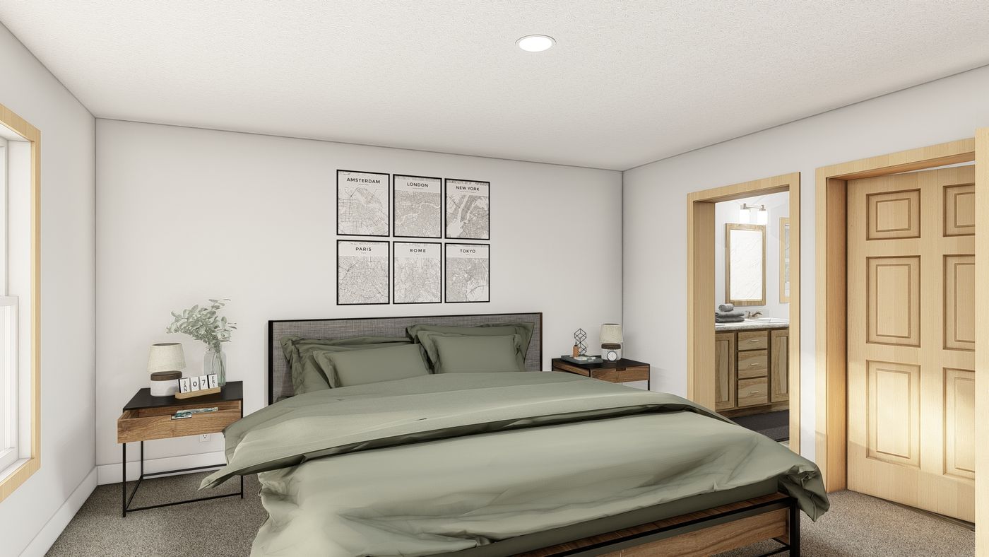 The LEGACY 377 Primary Bedroom. This Manufactured Mobile Home features 3 bedrooms and 2 baths.