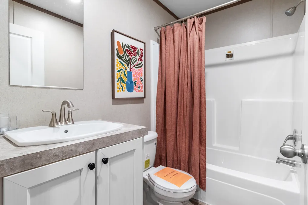 The SPIRIT Guest Bathroom. This Manufactured Mobile Home features 2 bedrooms and 2 baths.