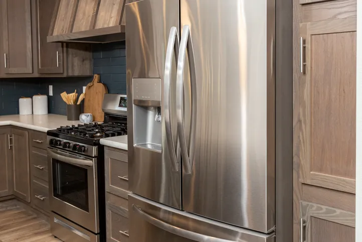 The LEGEND 86 Kitchen. This Manufactured Mobile Home features 3 bedrooms and 2 baths.