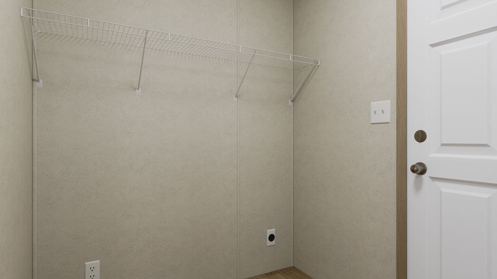 The 6014-CC02 CLEARPATH 60 Utility Room. This Manufactured Mobile Home features 2 bedrooms and 2 baths.