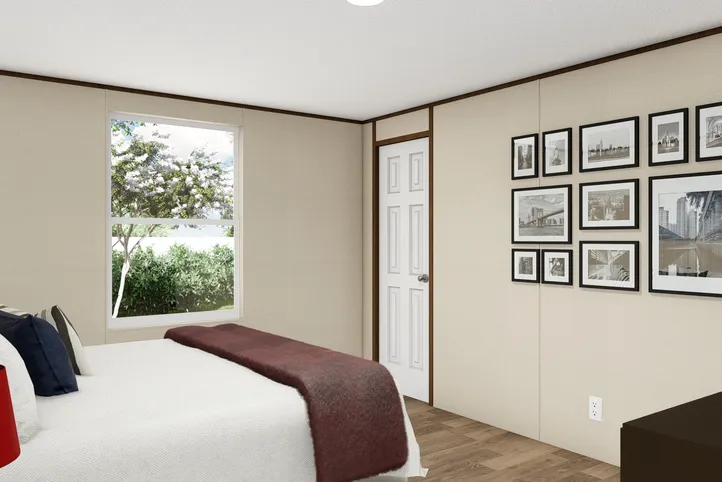 The PRIDE Bedroom. This Manufactured Mobile Home features 4 bedrooms and 2 baths.