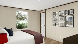 The PRIDE Bedroom. This Manufactured Mobile Home features 4 bedrooms and 2 baths.