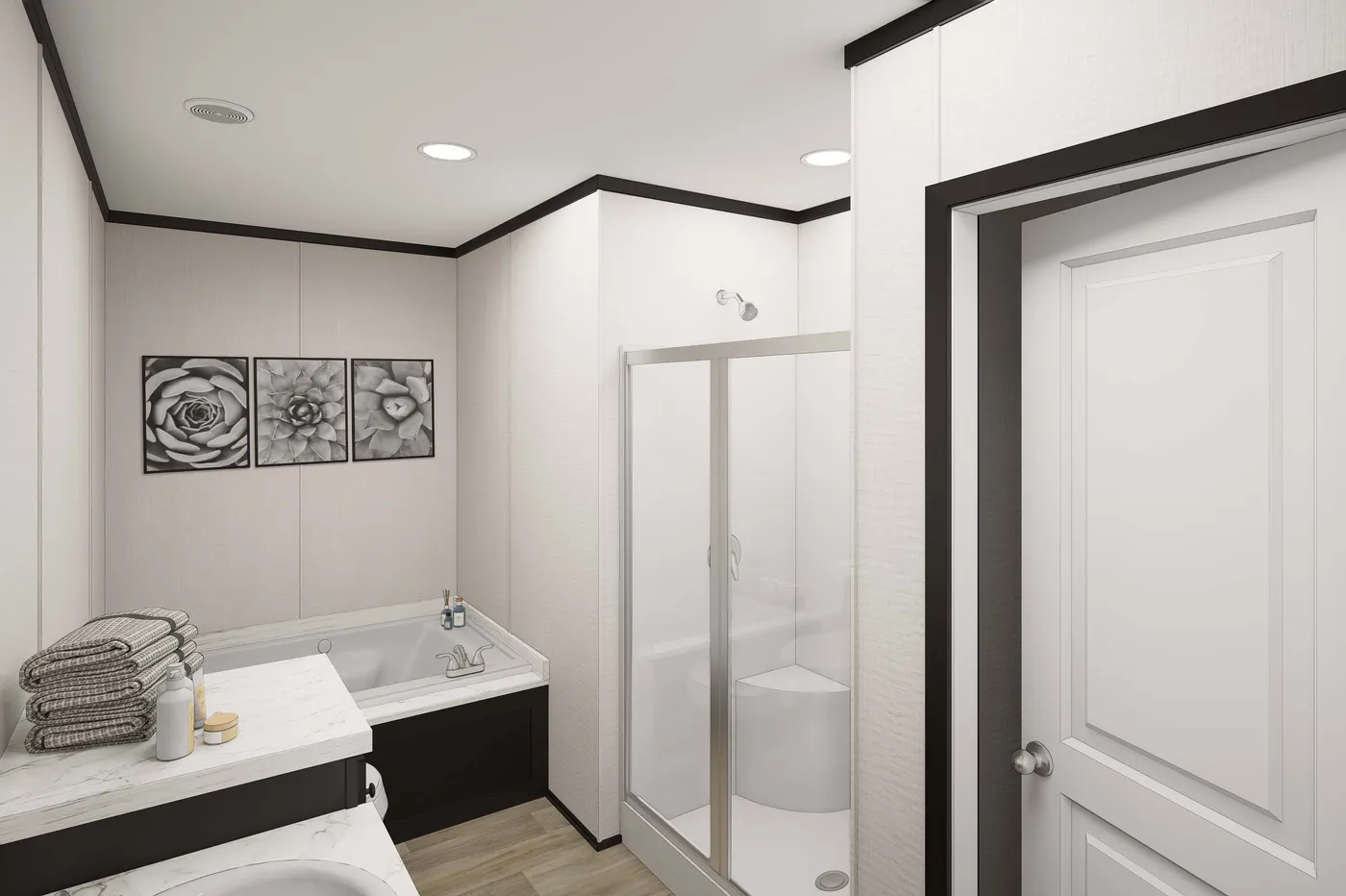 The PLATINUM ANNIVERSARY Primary Bathroom. This Manufactured Mobile Home features 3 bedrooms and 2 baths.