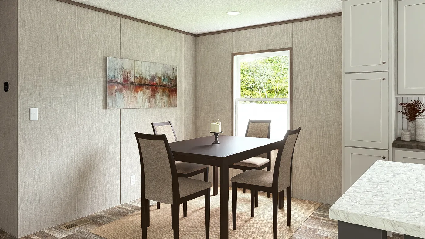 The ULTRA BREEZE 28X52 Dining Area. This Manufactured Mobile Home features 3 bedrooms and 2 baths.