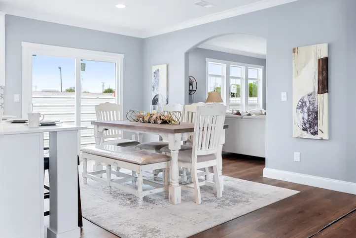 The THE ATLAS Dining Area. This Manufactured Mobile Home features 4 bedrooms and 3 baths.
