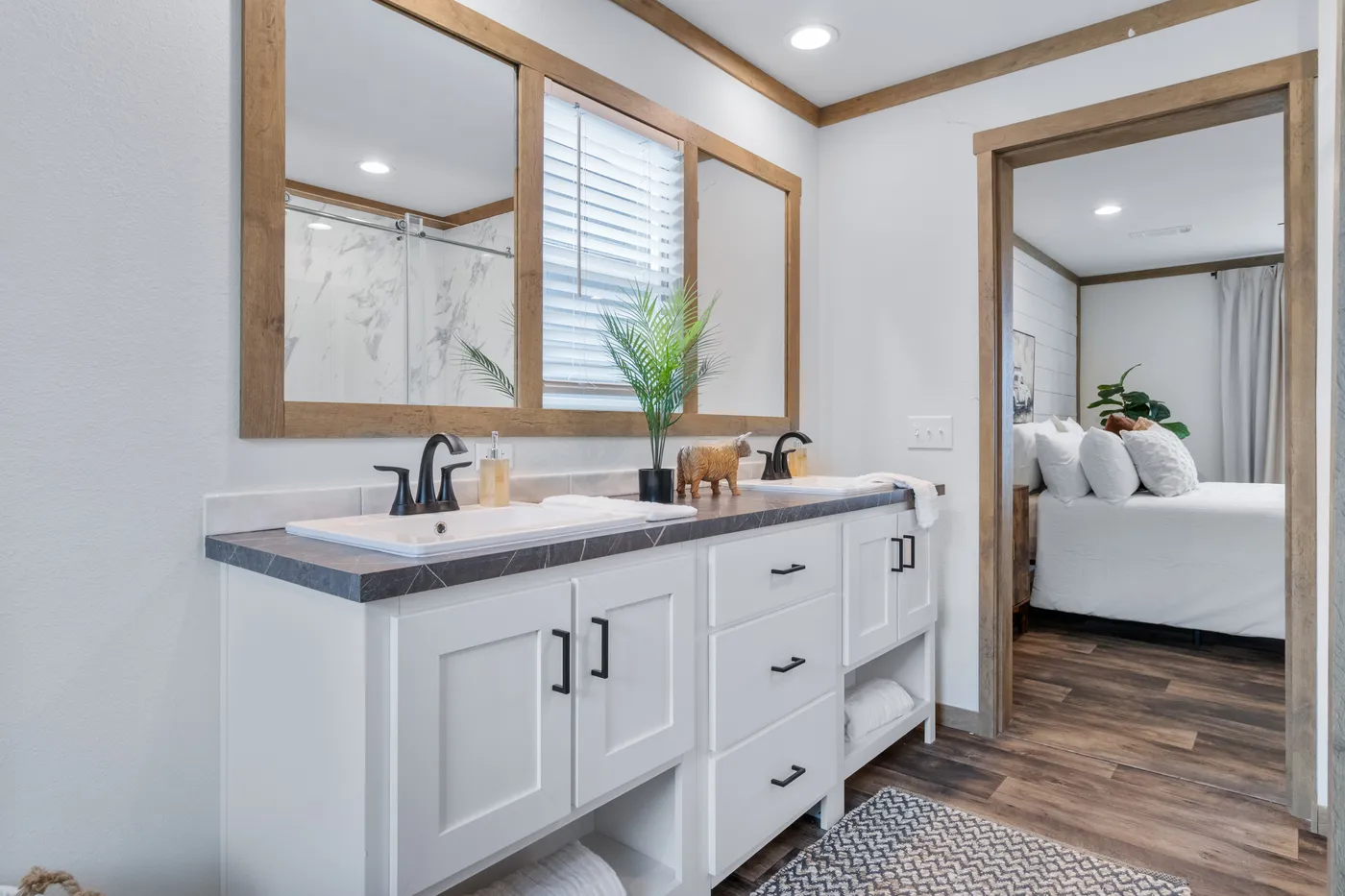 The SAWYER ELITE Primary Bathroom. This Manufactured Mobile Home features 3 bedrooms and 2 baths.
