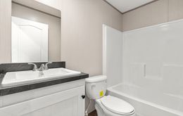The PORCH LIVING SERIES 16682A Guest Bathroom. This Manufactured Mobile Home features 2 bedrooms and 2 baths.