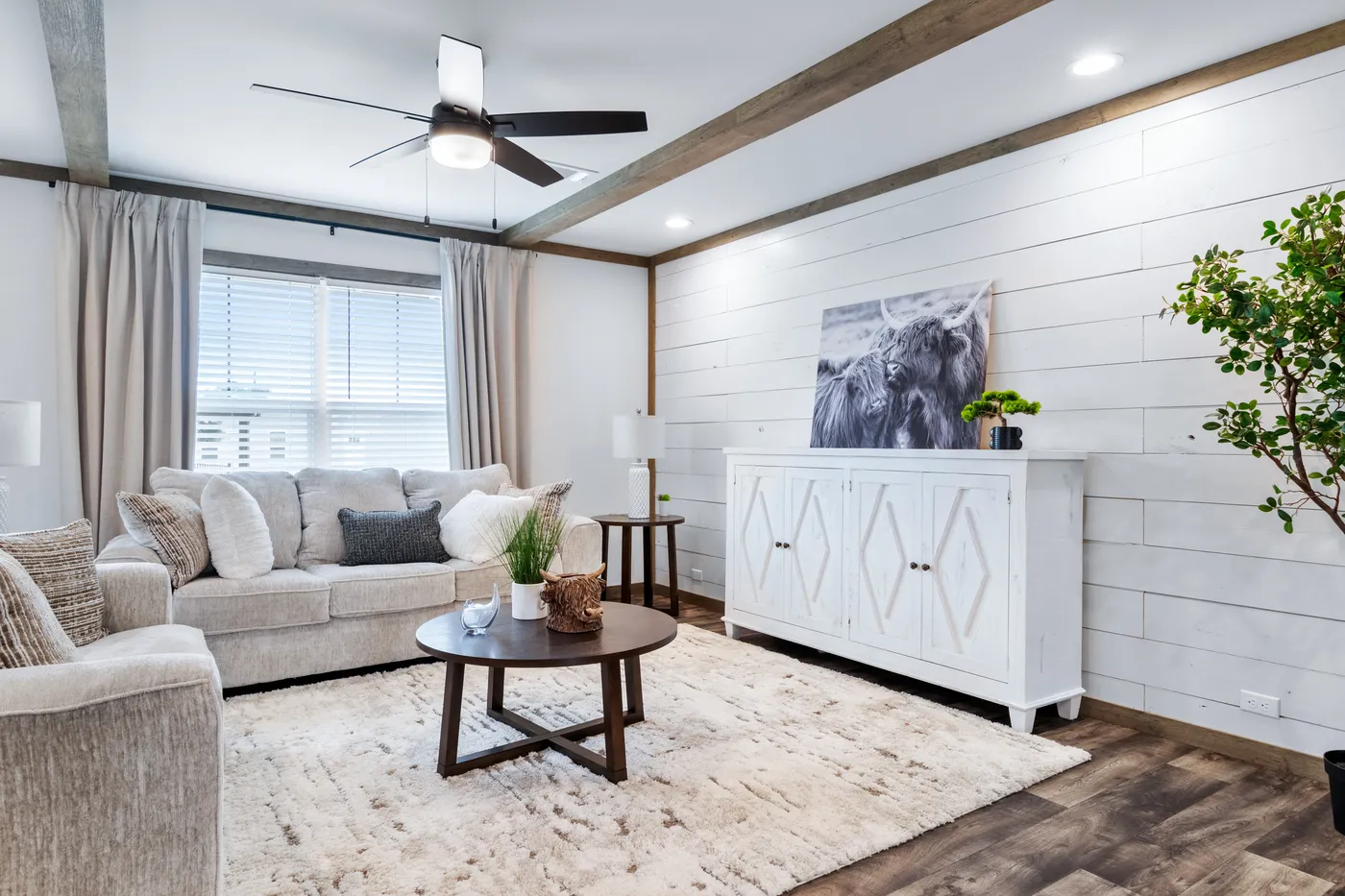 The SAWYER ELITE Living Room. This Manufactured Mobile Home features 3 bedrooms and 2 baths.