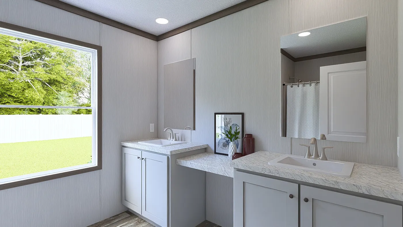The ULTRA ISLAND BREEZE 56' Guest Bathroom. This Manufactured Mobile Home features 3 bedrooms and 2 baths.