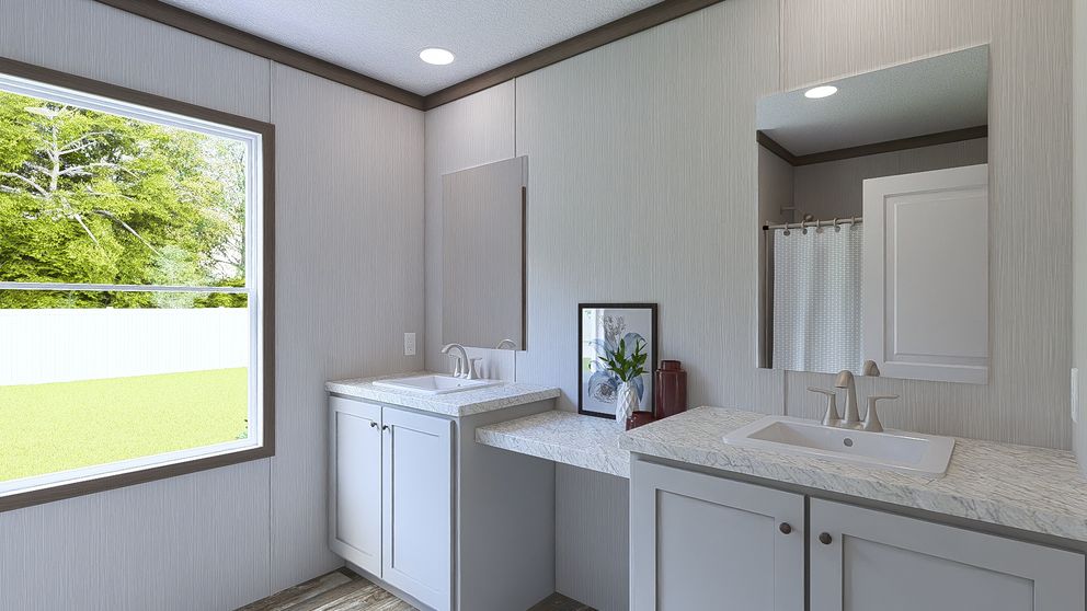 The ULTRA ISLAND BREEZE 56' Guest Bathroom. This Manufactured Mobile Home features 3 bedrooms and 2 baths.