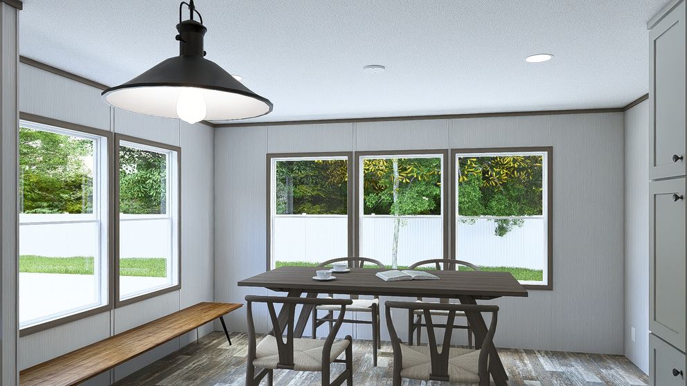 The ULTRA PRO JEWEL 3 BR 32X60 Dining Room. This Manufactured Mobile Home features 3 bedrooms and 2 baths.