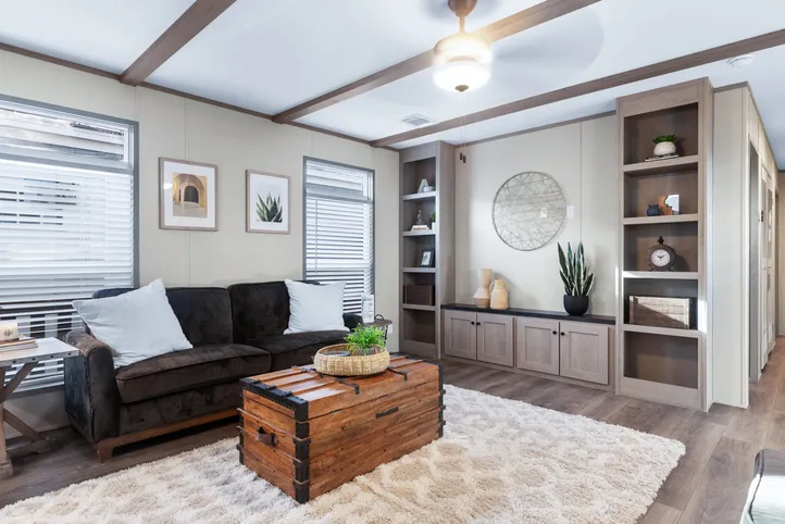 The ANNIVERSARY 16763A Living Room. This Manufactured Mobile Home features 3 bedrooms and 2 baths.