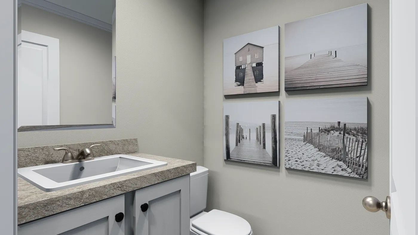The 7010 "YADKIN" 7616 Guest Bathroom. This Manufactured Mobile Home features 3 bedrooms and 2 baths.