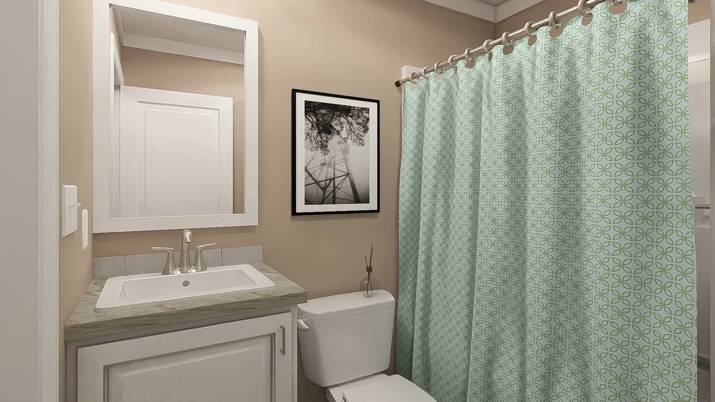 The THE DREAM Guest Bathroom. This Manufactured Mobile Home features 3 bedrooms and 2 baths.