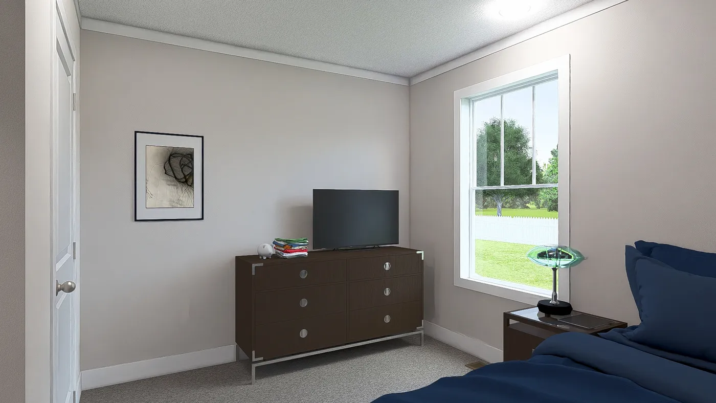 The THREE LITTLE BIRDS Guest Bedroom. This Manufactured Mobile Home features 3 bedrooms and 2 baths.