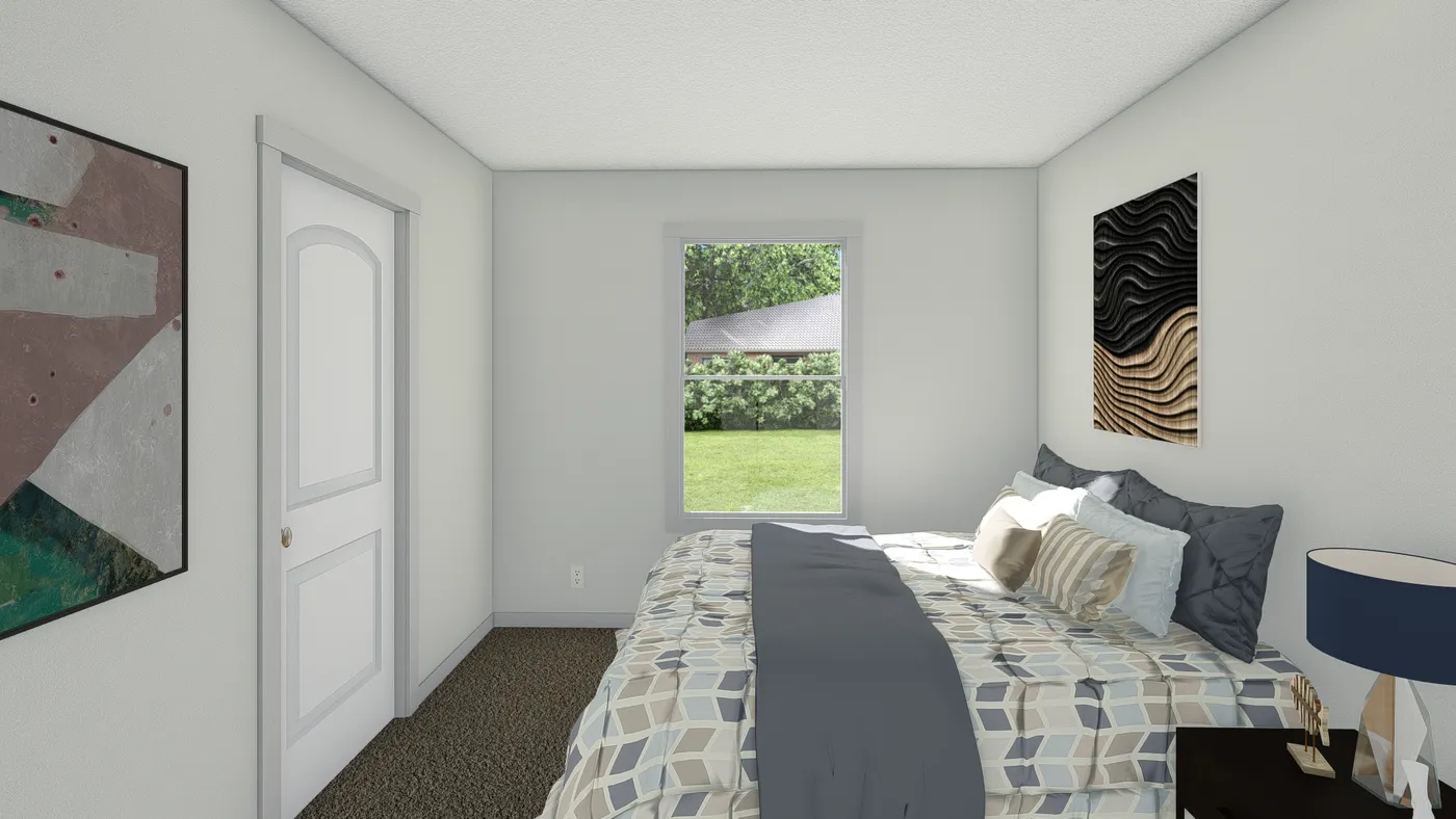 The ROCKET MAN Guest Bedroom. This Manufactured Mobile Home features 3 bedrooms and 2 baths.