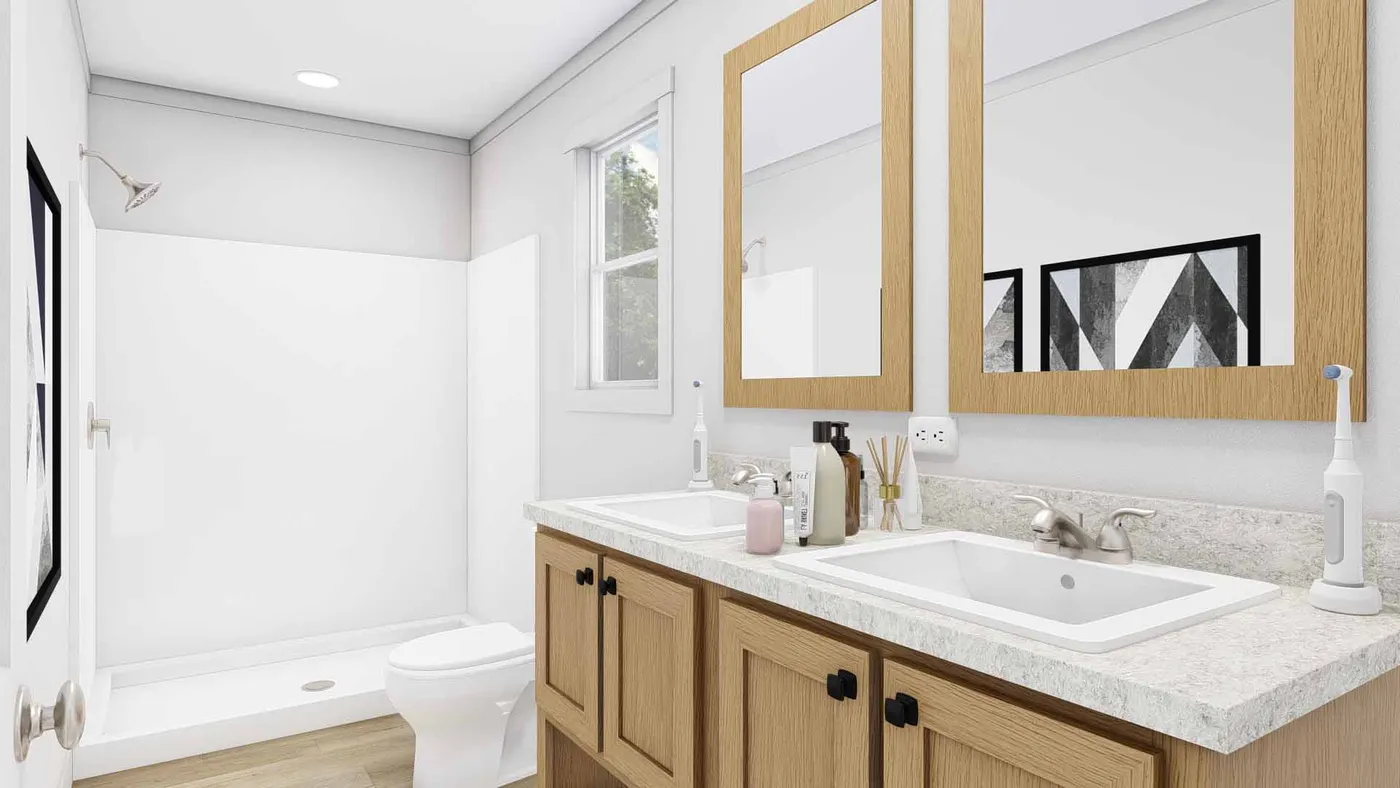 The JOHNNY B GOODE Primary Bathroom. This Modular Home features 3 bedrooms and 2 baths.