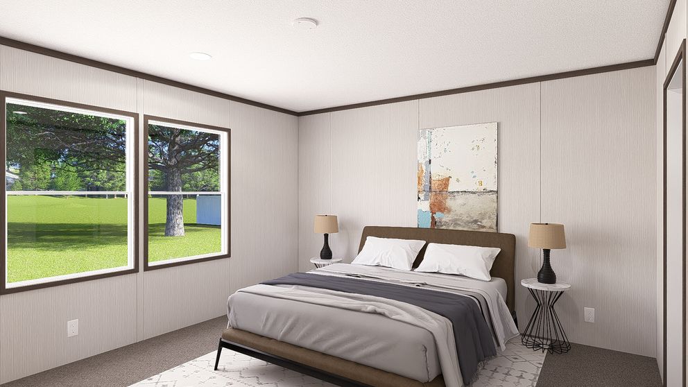 The LEGEND 28X68 Primary Bedroom. This Manufactured Mobile Home features 4 bedrooms and 2 baths.