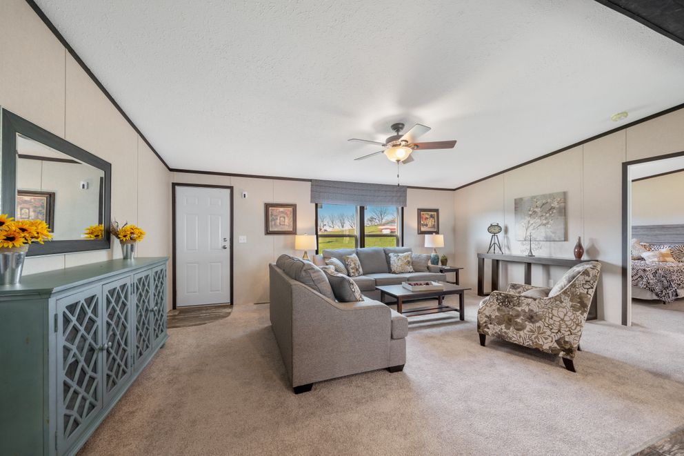 The GARNET Living Room. This Manufactured Mobile Home features 3 bedrooms and 2 baths.