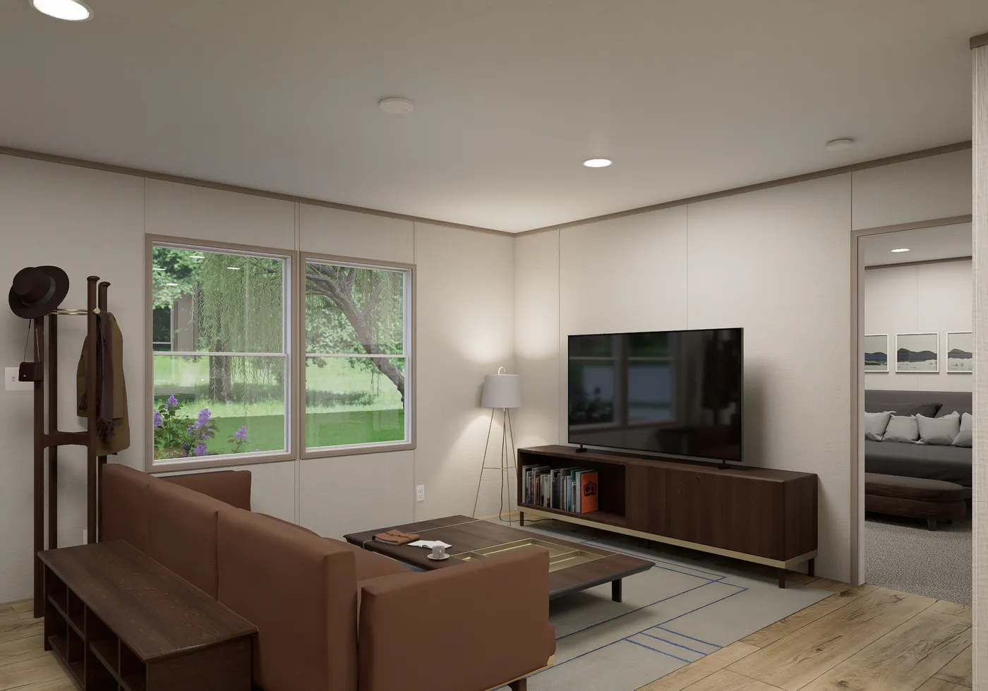 The ULTRA FLEX Living Room. This Manufactured Mobile Home features 4 bedrooms and 2 baths.