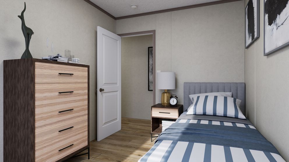 The 7016-CC03 HARBORVIEW 70 Guest Bedroom. This Manufactured Mobile Home features 3 bedrooms and 2 baths.