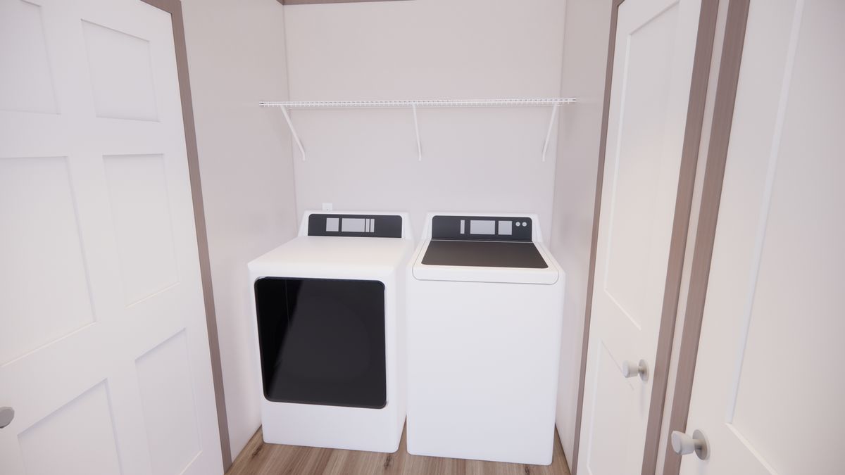 The 4828-E201 ADRENALINE Utility Room. This Manufactured Mobile Home features 3 bedrooms and 2 baths.