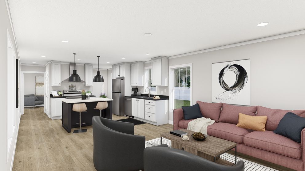 The SWEET CAROLINE Living Room. This Manufactured Mobile Home features 3 bedrooms and 2 baths.
