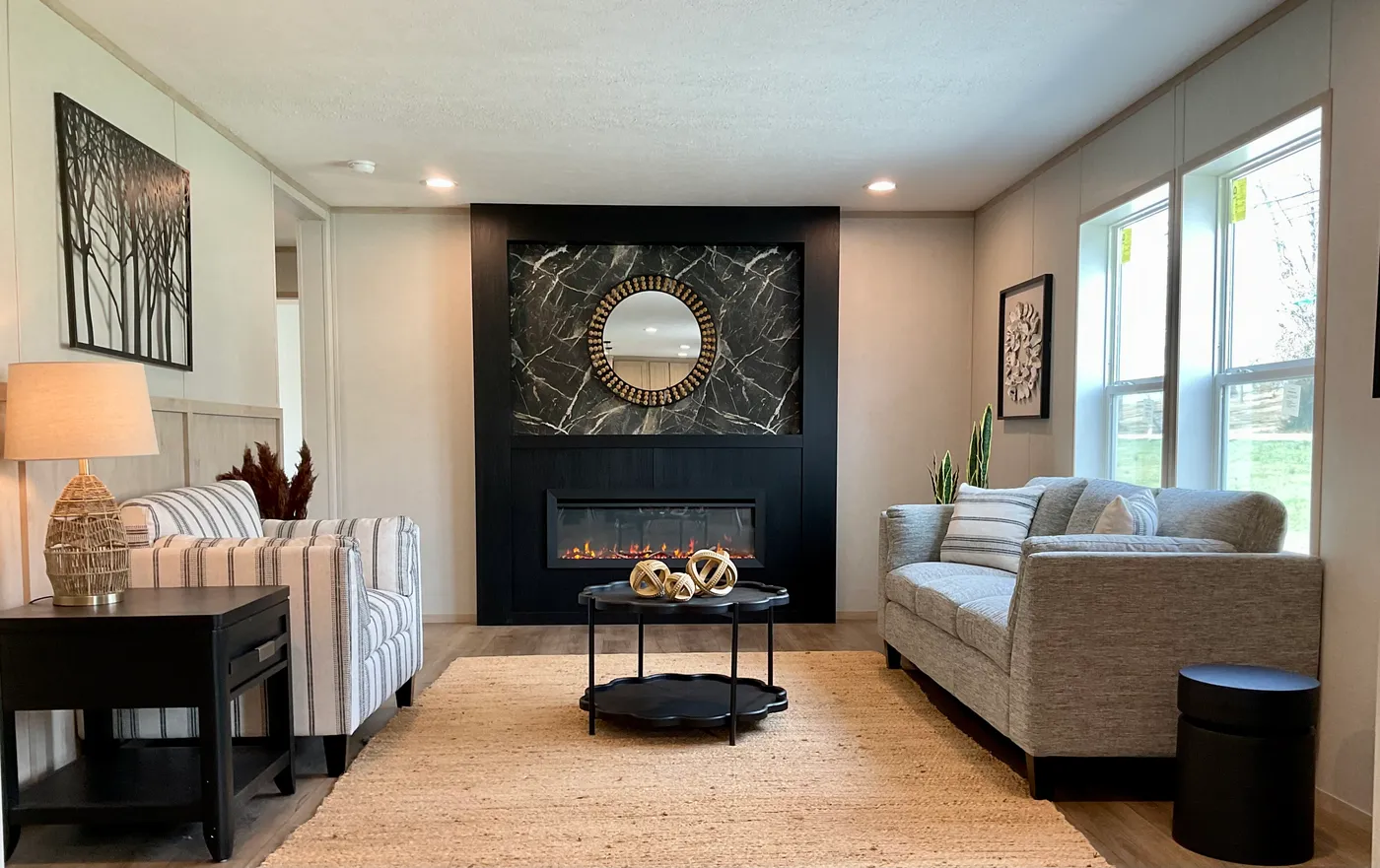 The EMERALD 7228-643 Living Room. This Manufactured Mobile Home features 4 bedrooms and 2 baths.