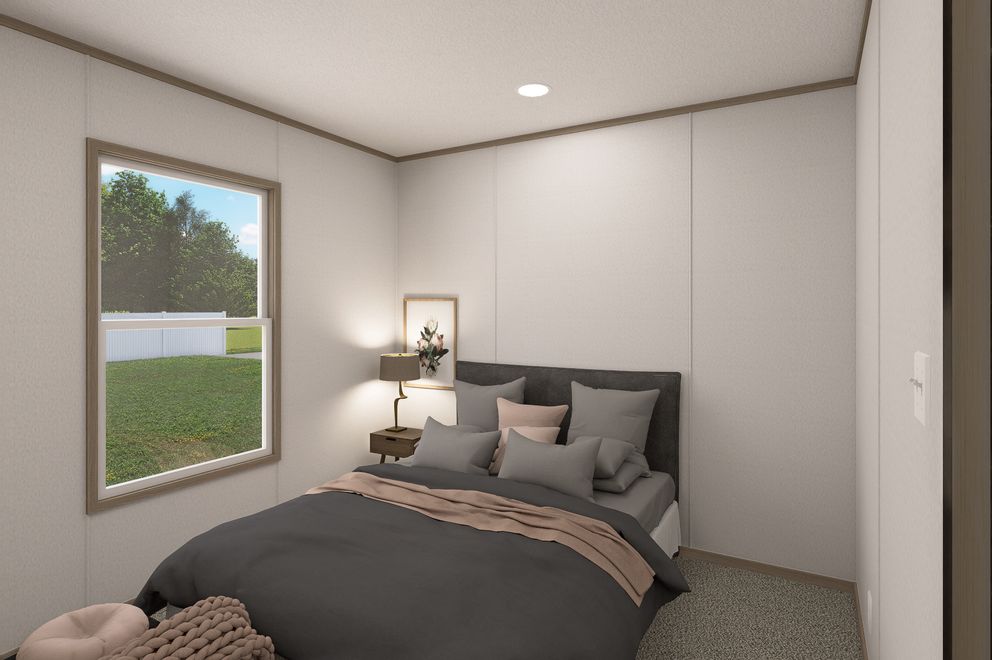 The THE EAGLE 48 Bedroom. This Manufactured Mobile Home features 3 bedrooms and 2 baths.