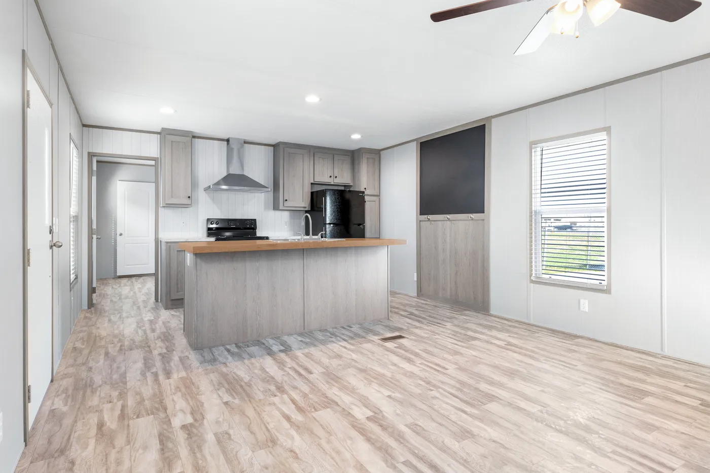 The BREEZE 16602A Kitchen. This Manufactured Mobile Home features 2 bedrooms and 2 baths.